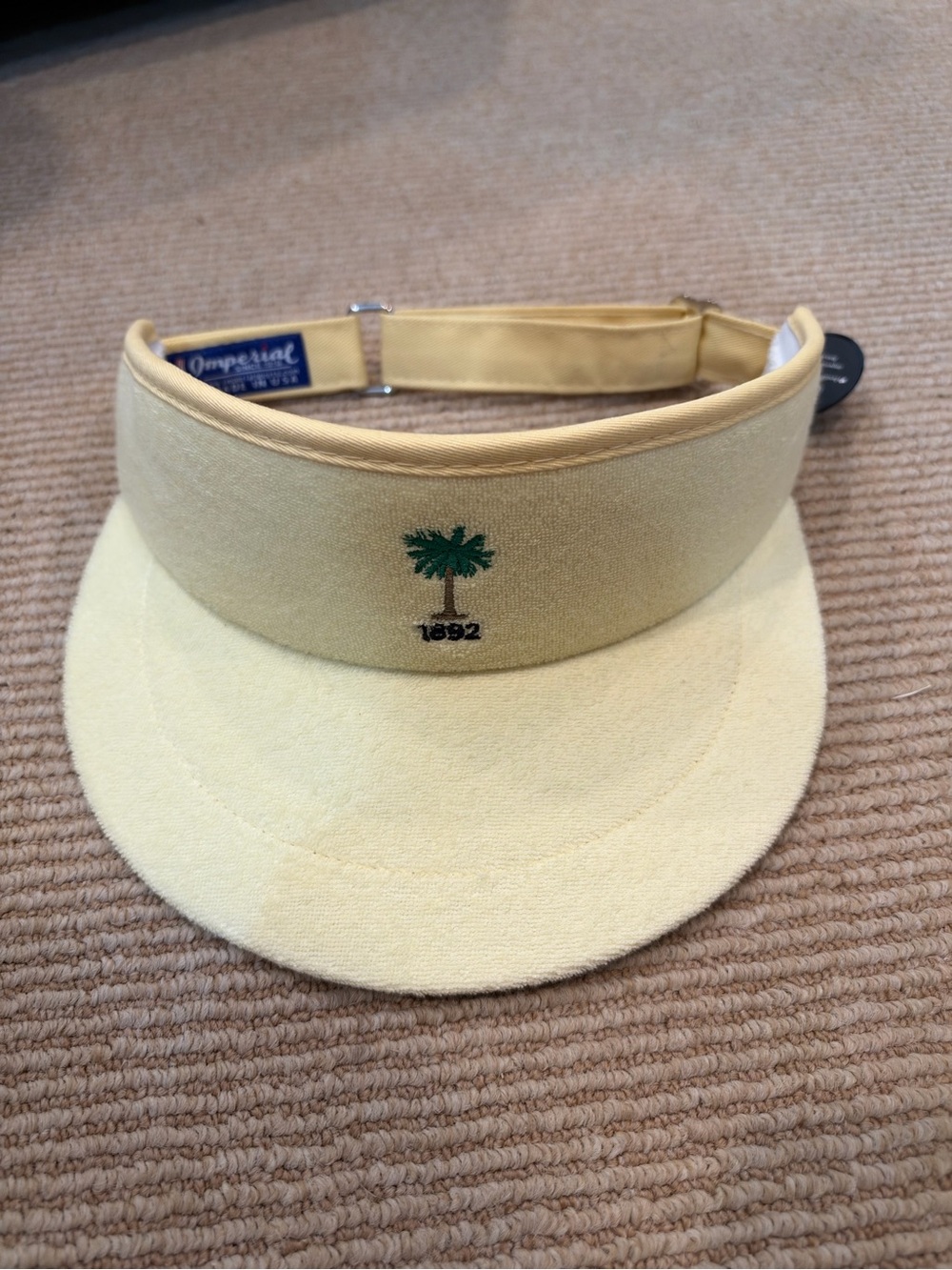 Palmetto golf club. Yellow terry cloth tour visor